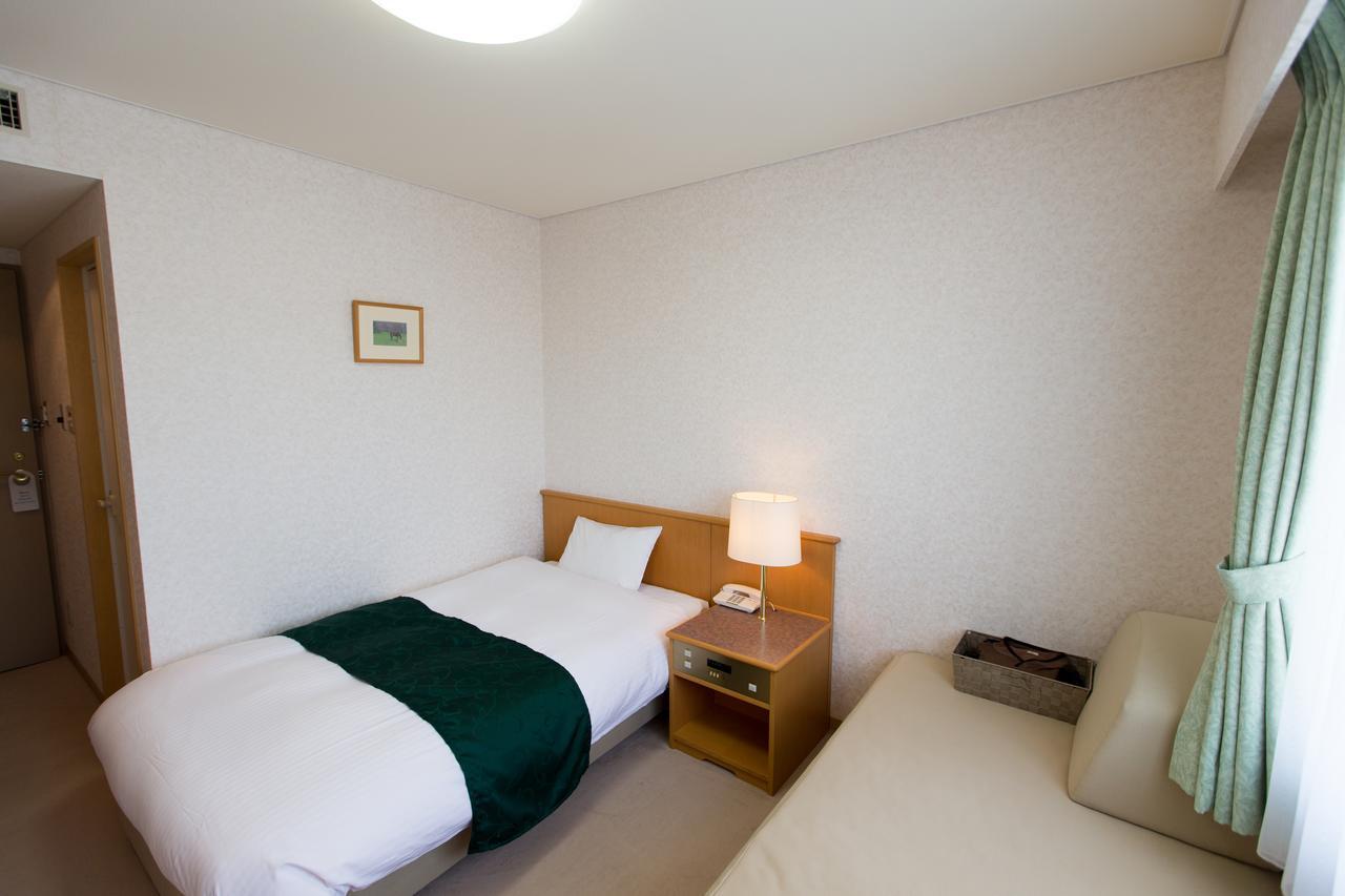 Hotel Laurel Синхидака Номер фото